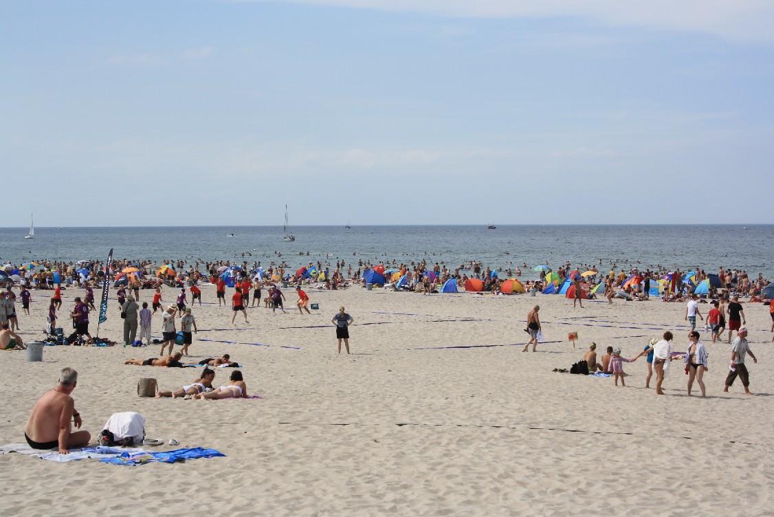 The beach of Warnemünde is wide and very close to the town center and in summer full of young people. 