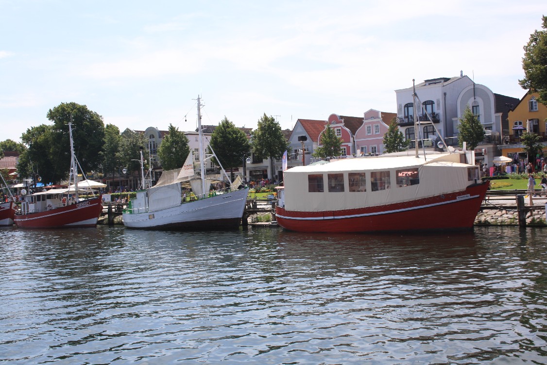 There is a busy and a little less busy side of the river. Standing on the bridge facing the fishing boats you can forget about all the people.