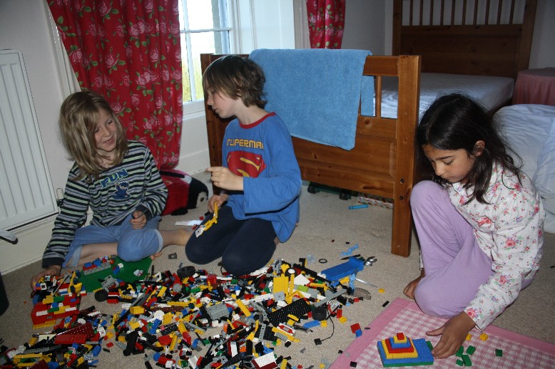 It doesn't take much to make friends out of stranger's children. 4,385 lego bricks do well. 