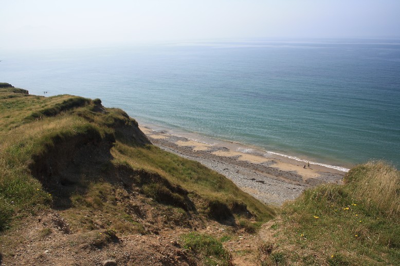 In the middle of the ironage hillfort that has partly being claimed by the sea. 